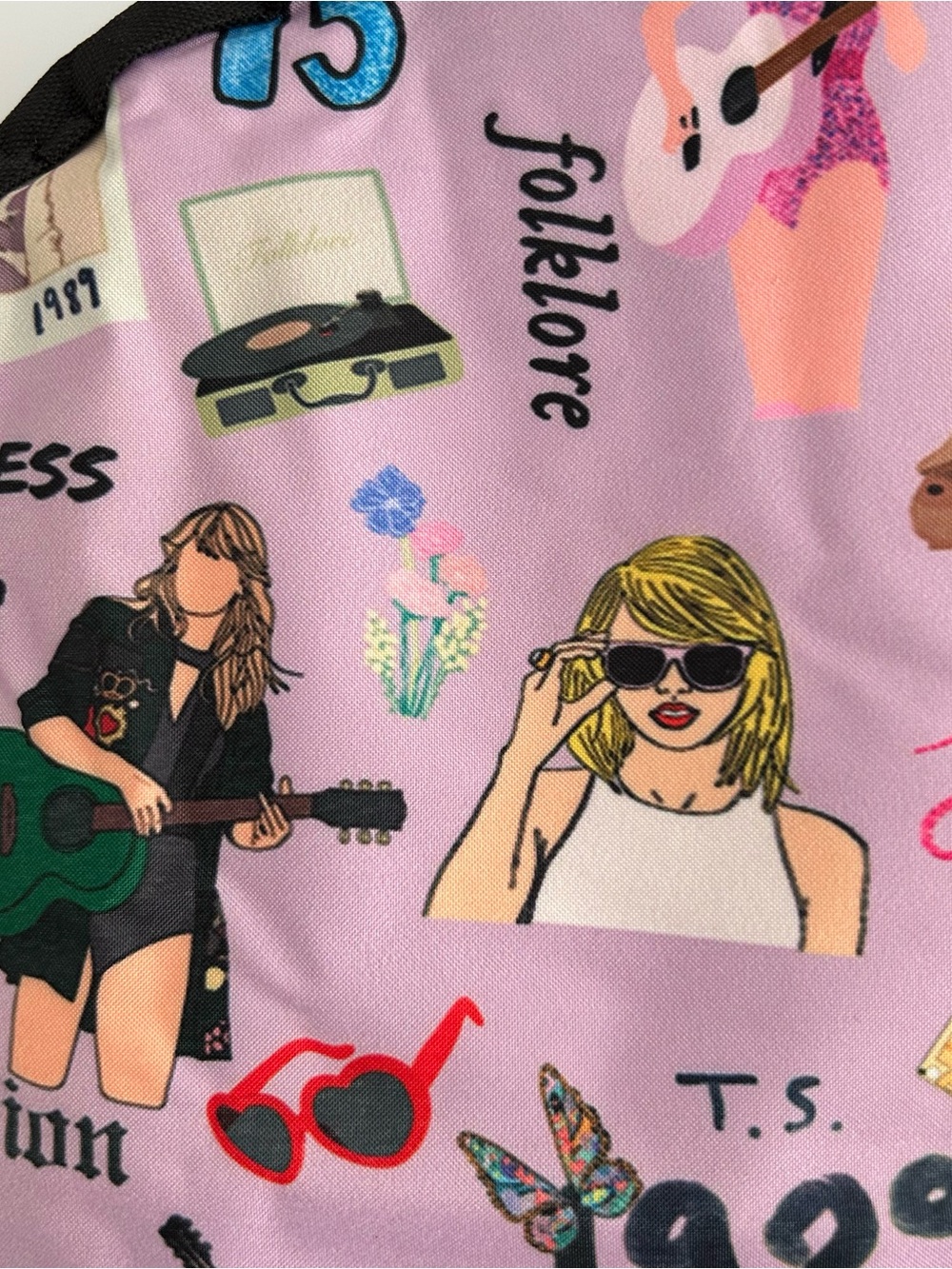 NWOT Taylor Swift 1989 Light Purple All Over
Colorful Print Black Back Sides - Picture 2 of 8